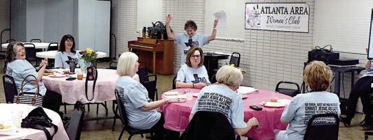 One can’t keep club members from laughing even at a distinguished part of the program.Sue Tomberlain is trying to give present a visual presentation of the club’s scholarship recipients through the years. Who will be the 2024 scholarship winners is th Women’s Club