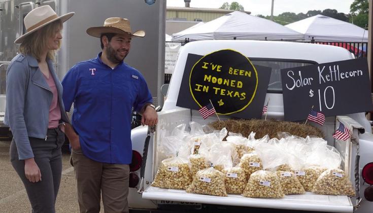 Of course, someone had to bring something to Maker’s Market Saturday to note the coming of the eclipse. Chris Easley tells his grandmother Gwen Johnson and aunt Donya Howard took this idea of moon and sun and turned it into a curious sign for the public Local Maker’s Market