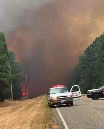 Fire ignites causing flames of more than 50 feet high, burning nearly 50 acres, and shutting down traffic. (Photo courtesy Cass County Emergency Services District #4) Large wildfire burns 50 acres in Linden