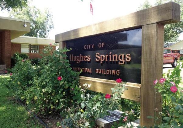 The official and artistic welcome sign for city hall in Hughes Springs. The official and artistic welcome sign for city hall in Hughes Springs.