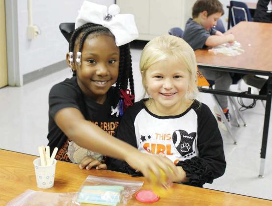 Students at J.K. Hileman Elementary experienced a STEAM Extravaganza last week in which they learned several different things from cookie decorating to coding at various stations. Photos by PHYLLIS WARREN J.K. Hileman Elementary holds STEAM Extravaganza
