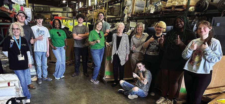 The smiles on the faces of these volunteers for E-Waste Recycle Day Saturday were for their fun helping others. The student helpers were volunteers from Atlanta High School. The Amity Club members were, from left, Marie Shelton, Teri Lovely, Jan Hamilton, E-Waste Recycle Day