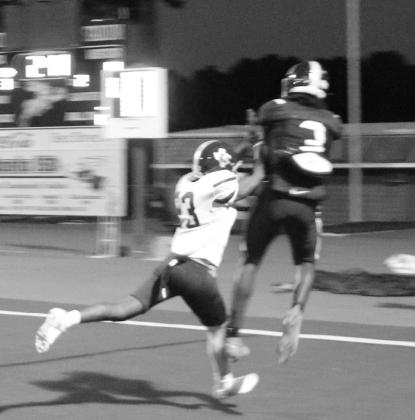 Atlanta’s CJ Whaley leaps into the air and comes down with the ball for a touchdown. Photos by Kim Sheppard