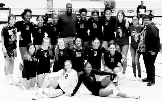 Atlanta’s volleyball team had to make room in the trophy case for another title after beating Sabine for the Area title over the weekend.That goes along with its District and Bi-District crowns. Photo by KIM SHEPPARD Lady Rabbs win Bi-District,Area crowns
