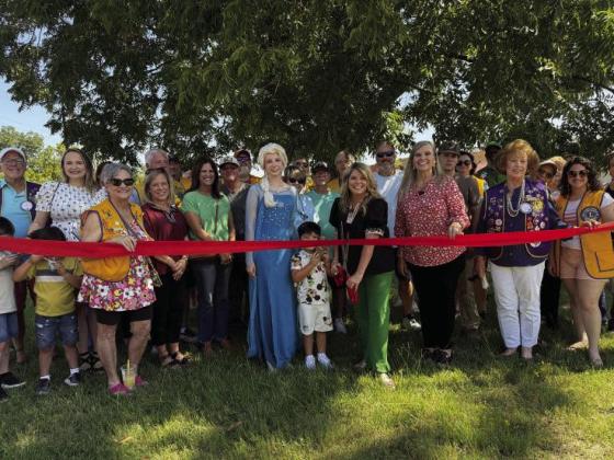 Plenty of Lions Club members, family, friends and even Elsa attended the Chamber of Commerce ribbon cutting for travel agent Amy Barber with Crazy Imagination Travel on Aug. 16.