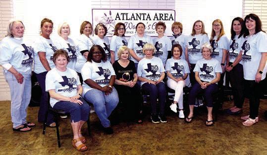 Wearing their tee-shirts in support of Adam O’Kelley are members of the Atlanta Area Women’s Club.They are,from row from left, Sue Tomberlain, Karen Casteel, Kathy O’Kelley, Kathy Gilbert, Elaine Carney and Mandy Vowell. Back row, Arlene Oliver, She Women’s Club