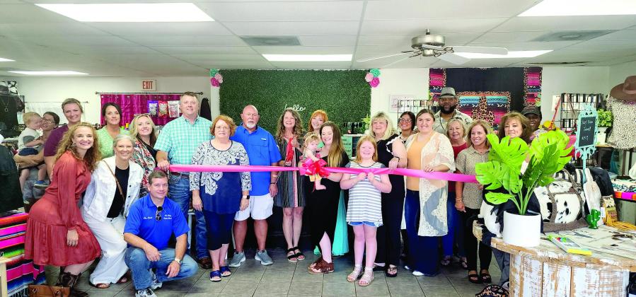 Two ribbon cuttings welcome two new specialty stores in one