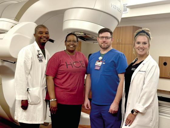 Pictured with Shuntrece Epps, breast cancer survivor (second from left) are some of the members of her cancer treatment team – from left, Charles Matthews, M.D., Medical Director of Radiation Oncology; Dana Tiderington, radiation therapist; and Brandi S CHRISTUS St. Michael Health System adds new linear accelerator for treatment of cancer
