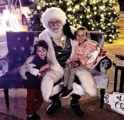 Jaxon and Serenity Parshall were able to catch a picture with Santa just before he took off for the North Pole. Santa was one of the main attractions at Hometown Christmas last weekend. Photo by Casey Williams Jaxon and Serenity Parshall were able to catch a picture with Santa just before he took off for the North Pole. Santa was one of the main attractions at Hometown Christmas last weekend. Photo by Casey Williams