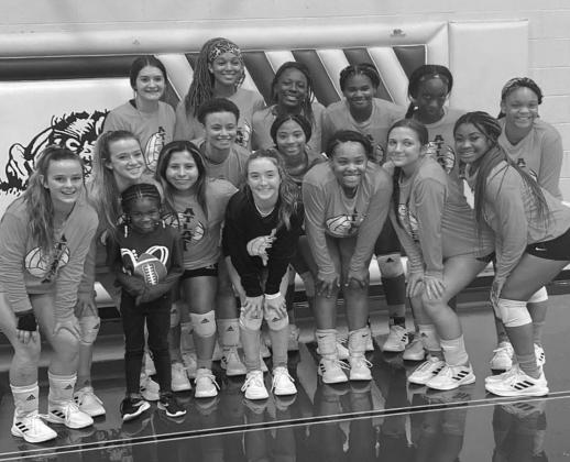 Atlanta’s varsity volleyball team is all smiles after taking down New Boston in three sets and running its record to 10-0 in district play. Photo by JESSICA PATTILLO Lady Rabbs stay undefeated in district play