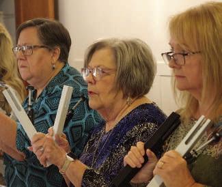 How can it be that such small, hand-held instruments produce spiritual meditation? Perhaps it is because of the way they are played.The Queen City chimers above are, from left, Cathie Maley, Pam Shirley and Holly Holmes.They hold their musical instruments How can it be that such small, hand-held instruments produce spiritual meditation? Perhaps it is because of the way they are played.The Queen City chimers above are, from left, Cathie Maley, Pam Shirley and Holly Holmes.They hold their musical instruments