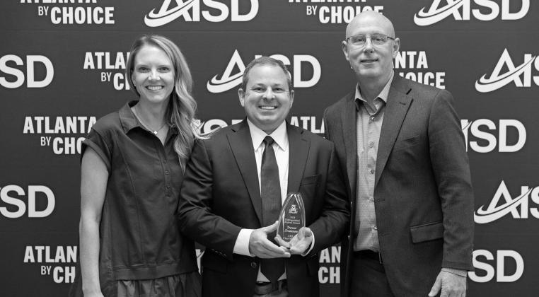 Dr.Trevor Swanson, a 1992 graduate of AHS, was honored during the Distinguished Alumni 2024 ceremony on Sept. 27. Swanson is pictured with the Atlanta Education Foundation Alumni Representative Jaci Price and Atlanta ISD Superintendent Jason Harris. Dr. Trevor Swanson, a 1992 graduate of AHS, was honored during the Distinguished Alumni 2024 ceremony on Sept. 27. Swanson is pictured with the Atlanta Education Foundation Alumni Representative Jaci Price and Atlanta ISD Superintendent Jason Harris.