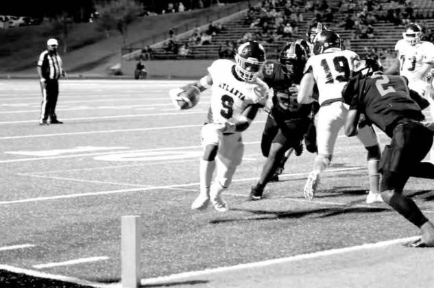 Atlanta running back Keith Kinney heads for the pylon and scores against Gladewater. Football 1 – Photo by Maggi Whitlow Atlanta falls in district contest against Gladewate