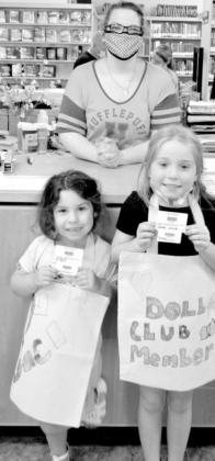 Photo by Kate Stow Jaci and Jemma Sullivan got their very own library card. It’s free, and only takes a few minutes, and an adult to fill out the form. Now they can check out any books and videos they want to read! Library offers unique after school clubs