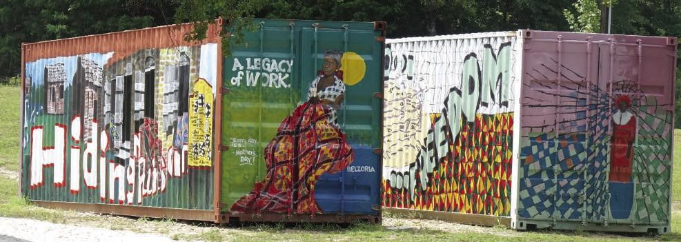 Art works by James “Shinar” Coleman on the sides and ends of two large trailers help tell the story of Pleasant Hill Rosenwald School’s popular program,“The Secret Code Quilts of the Underground Railroad.”
