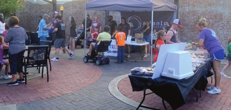 Nonprofit members sold food for fundraising or gave it away as an outreach. Organizations included GT Church, Christian Fellowship Church, Laws Chapel, Atlanta FBC and QCISD Archery. (Courtesy Jill Crocker Atlanta Area Chamber of Commerce) On June 10