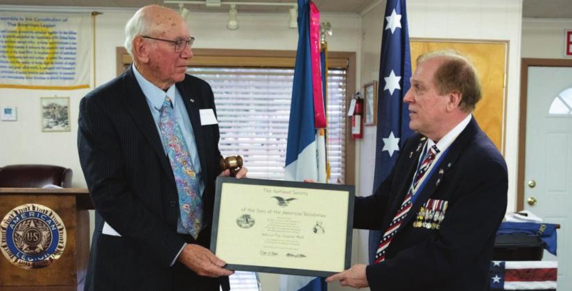 Pictured is Chapter President Clarence Burns being presented the Charter from Texas Society, President Drake Peddie. New area SAR chapter to meet in Atlanta