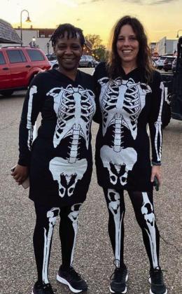 These super cute skeletons, Karmen and Jennifer patiently wait for the 5K Glow Run to start for the grownups while watching the kids finish their mile. Hiram haunted by glowing goblins, ghouls