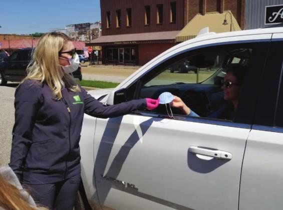 Local business gives away face masks