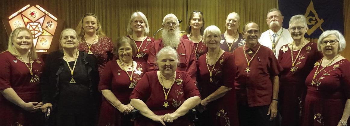 Newly installed officers for the Linden Chapter, Order of the Easter Star, stand with their new worthy matron Annette Olsen seated center.Middle row from left, Lacy Engledowl,Cathy Zachry,Gayle Riddle,Sally Hunt,Paul Pop Hunt,Charleen Granberry and Caroly Linden Order of Eastern Star