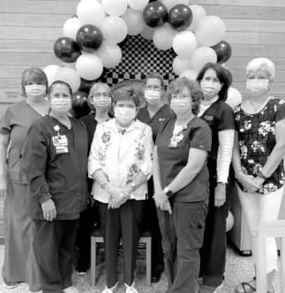 Fran Wyatt is pictured with CHRISTUS St. Michael Hospital - Atlanta with volunteers, hospital staff, family and others. CHRISTUS honors Wyatt