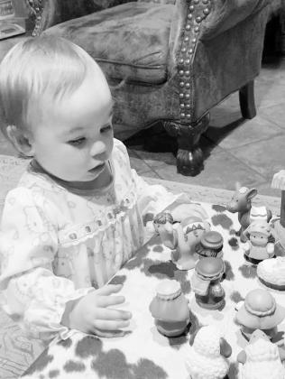 One-year-old Lydia with her nativity set, reflecting a legacy of faith and family. Courtesy of Rhonda Surratt One-year-old Lydia with her nativity set, reflecting a legacy of faith and family. Courtesy of Rhonda Surratt