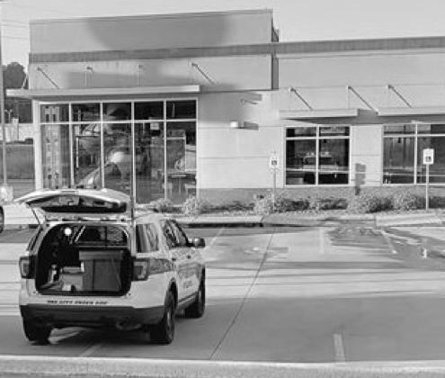 Police are seen taping off the area around Burger King Saturday afternoon to investigate a burglary that occurred just before 1 a.m. Saturday. Local restaurant burglarized