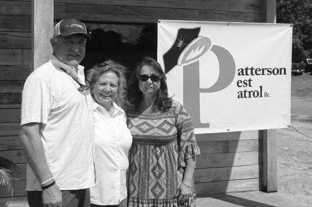 Pattersons Pest Patrol staff cut ribbon on new offices
