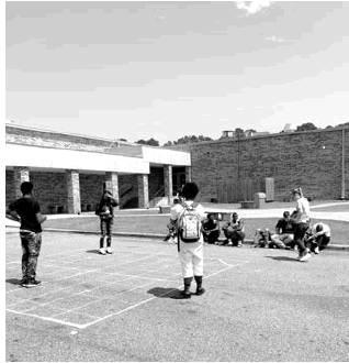 The Algebra Lab students went outside Friday afternoon to review coordinate points and slope using a life size graph. The students were each assigned a coordinate point and then used string to “draw” the line segments so they could determine the type Article Image Alt Text