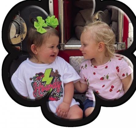 Wrenley & Evelyn pictured on the Red Hill VFD Fire Truck