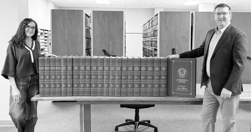 Cass County District Clerk Jamie Albertson with Cass County Judge Travis Ransom with newly restored historic documents. Courtesy photo Cass County District Clerk Jamie Albertson with Cass County Judge Travis Ransom with newly restored historic documents. Courtesy photo