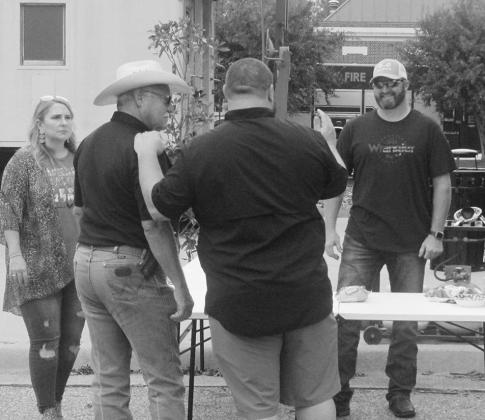 A chili cook-off was held recently in downtown Atlanta close to the Chamber of Commerce. Hagan Allen, far right, won a prize for the best chili. Photo by Raydeen Edwards Andrew Jefferson Dooley family