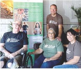 This group has organized to create awareness of the rare disease of Superficial Siderosis. That’s Gary Daniel at left, Rori Daniel seated center and Tanya Beers at right.Wisconsin president of the 501 C-3 is Kyle Dempsey, standing, who is visiting Caffe Linden family, Atlanta business lead effort for Siderosis