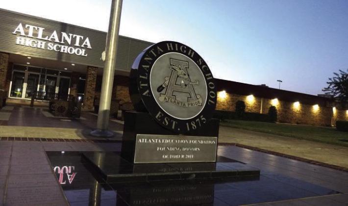 Atlanta school district’s building and grounds are stylish and filled with pride.This is the high school’s front entrance. It pays attention fo the school’s foundation and long-lasting importance with granite signs. Students and the public are pleas Night scenes provide soothing escape