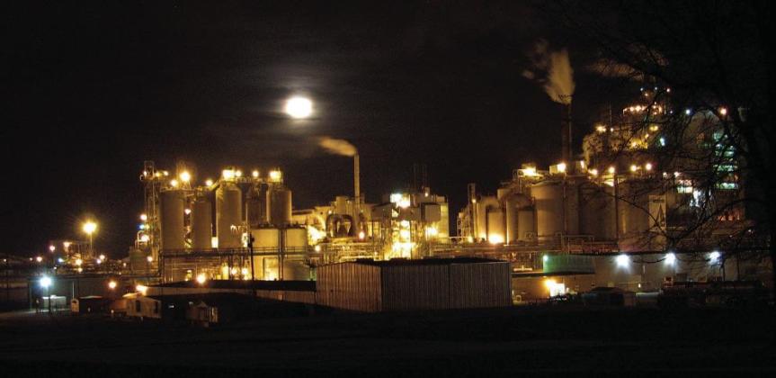 Saturday the 23rd of March several years ago was supposed to preview a very big moon low on the eastern horizon.And so the Journal photographer went to see the silvery circle compete with the golden globes of industry. Big industry, and International Pape Night scenes provide soothing escape
