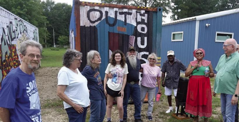 Being first on the Juneteenth tour last week is this group of neighbors. They are members of the Fallwell, Monroe and Small families and have come to see more closely the“Last Railway Station” public art display. The tour guide is Sharon Haynes, the p