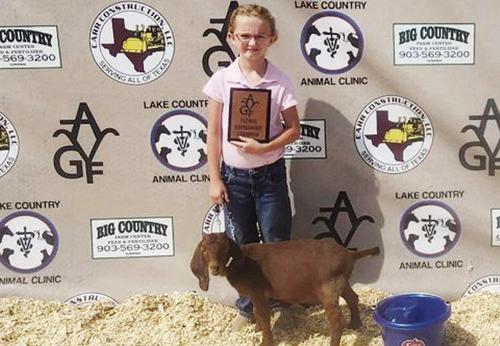 McLeod second-grader, Daisy May Haley, won first place with her goat at the Alba-Golden Young Farmers Livestock Show last weekend. Atlanta Middle School’s