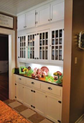 The existing butler’s pantry has an updated look. The Hanner House