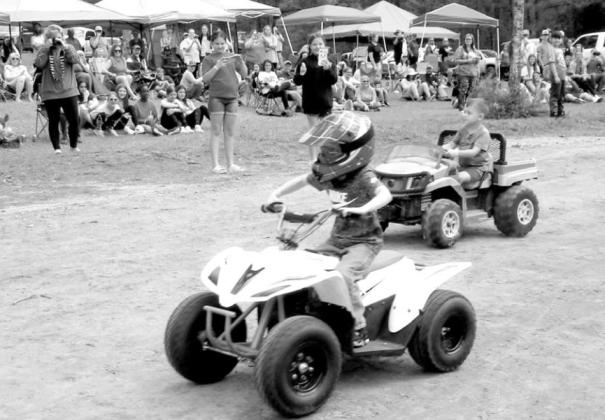 IT’S ALL ABOUT... Lawnmower races