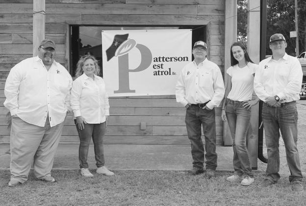 Pattersons Pest Patrol staff cut ribbon on new offices