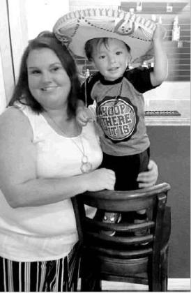 Tina and Ethan Harvey celebrate their adoption day with family and friends at Uncle Juan’s Saturday. Article Image Alt Text