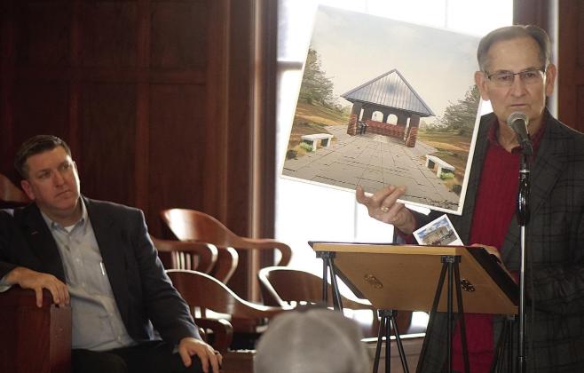 Sam Higdon is showing a artist’s rendition of a planned educational and historical monument at city park which will be a place not only of history but also of present day understanding. County Judge Travis Ransom is at left. Heritage Foundation celebrates Martin