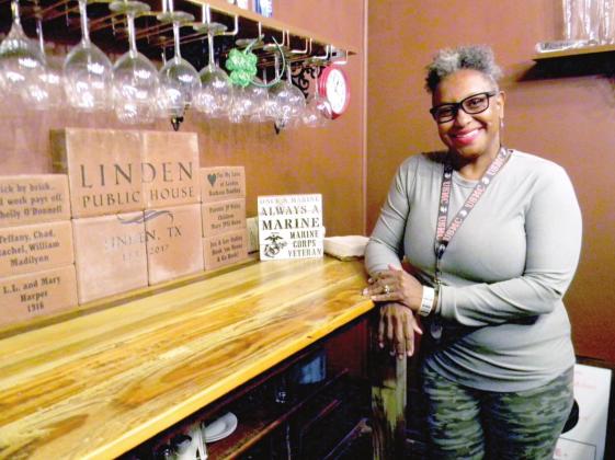 Natalie Gorman is the owner of Linden Public House restaurant and will be serving classic Southern staples such as baked macaroni and cheese, pulled pork, and collard greens starting Thursday, April 15th at their grand opening. Photo by Sydni Goza Linden Public House reopening