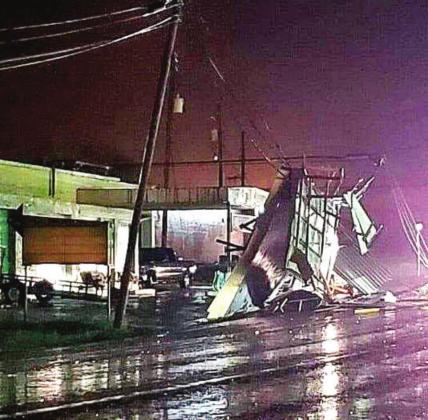 Top Four Photos by Lucy Trahan/Bottom Courtesy Photo Microburst causes damage throughout county