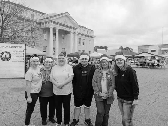 Main Street Board Members worked hard to make the 2022 Christmas on the Square a success. (Courtesy Photo) Article Image Alt Text