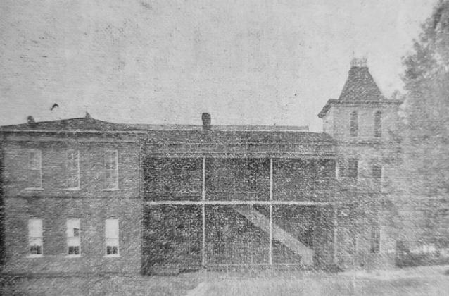 The new two-story brick school immediately upon completion in 1893. From one room to two stories -