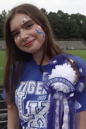Linden-Kildare High School exchange student Lena Matuszak from Germany is attending her first American football game. Lena is a junior grade student. She’s painted her face just perfectly for her adopted school.