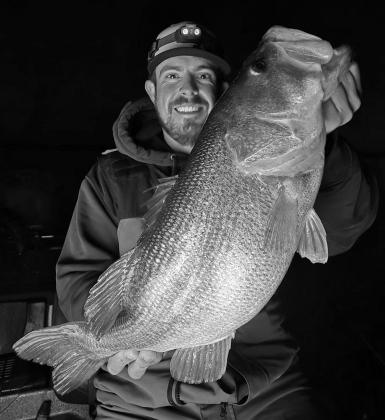Fishing guide Christian Gladfelter first discovered the robust bass fishery at J.B.Thomas in May 2023. He has since steered his clients to hundreds of double-digit bass, many of them coming under the cover of darkness. (Photo courtesy of Christian Gladfel Fishing guide Christian Gladfelter first discovered the robust bass fishery at J.B.Thomas in May 2023. He has since steered his clients to hundreds of double-digit bass, many of them coming under the cover of darkness. (Photo courtesy of Christian Gladfel