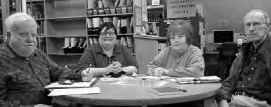 Sitting together for a moment to remember their friend and library leader are, from left: Evan Evans, Tammie Davidson, Charlotte Evans and Charles Steger. They met recently to tell the story of her leadership for the Atlanta Public Library. Friends gather to remember their library director Jackie Icenhower