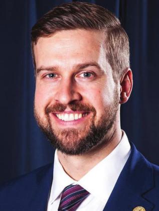 DR. ADAM COX Cox awarded optometrist of the year